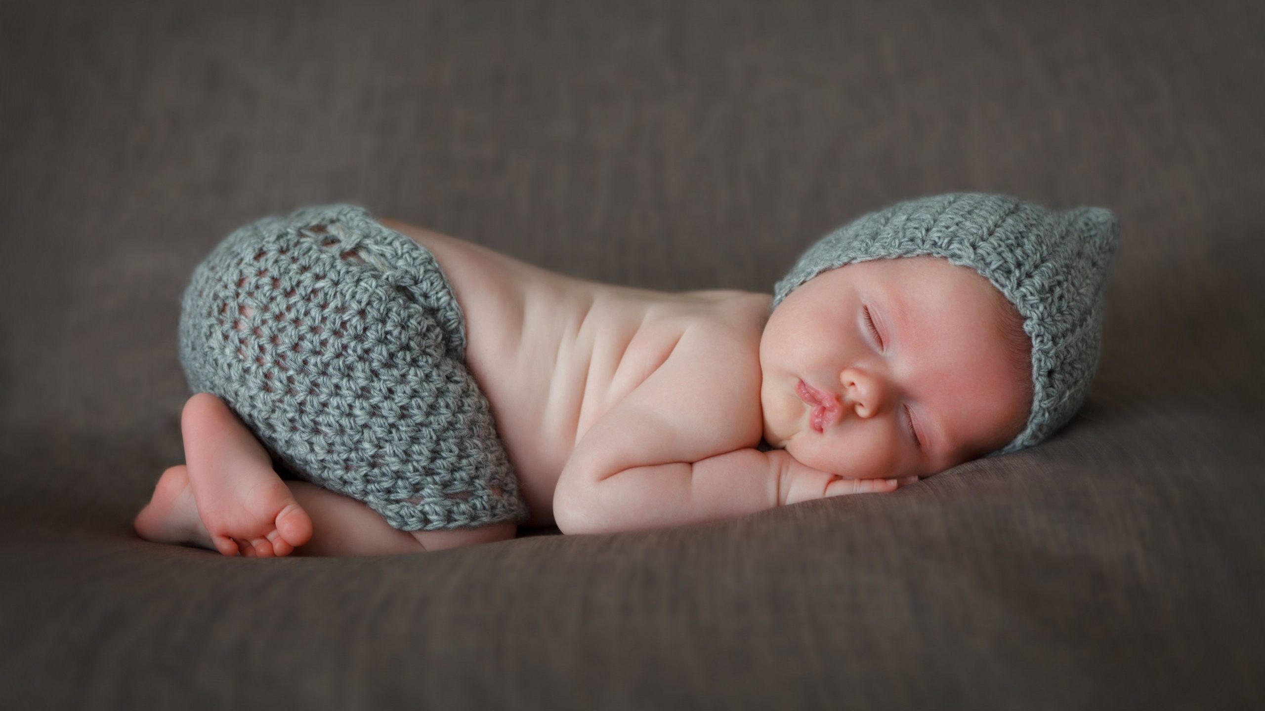new-born-cute-sleeping-baby-wallpaper-76000816